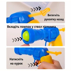 Іграшка для котів Пістолет з помпонами 30 шт CAPSBOARD (250011)